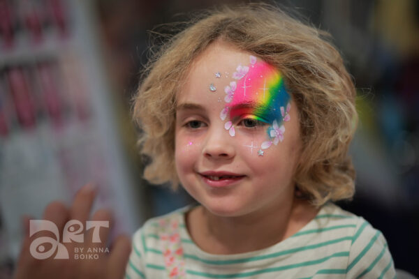 Rainbow face painting by Anna Boiko