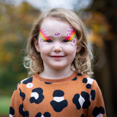 Rainbow face painting by Anna Boiko