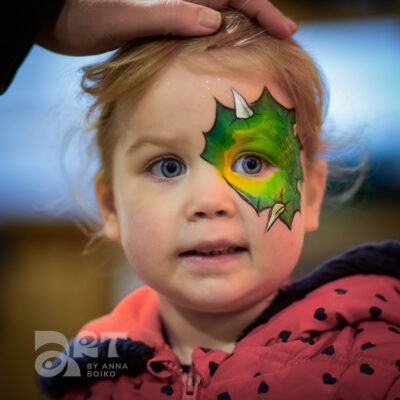 Small green dragon face painting by Anna Boiko